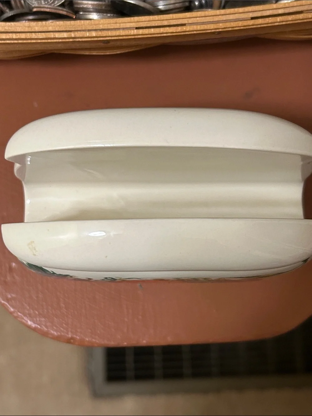 VTG Cornucopia ceramic napkin holder featuring a colorful raised fruit mot